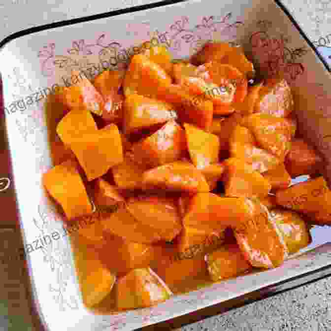 A Close Up Of A Plate Of West Indian Orange Candied Sweet Potatoes West Indian Orange Candied Sweet Potatoes: A Great Vegetarian Dish