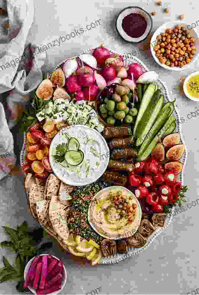 A Colorful Spread Of Lebanese Mezze, Including Hummus, Baba Ganoush, Tabbouleh, And Fattoush Tapas And Lebanese Cookbook: 2 1: 120 Recipes For Traditional Lebanese And Spanish Dishes