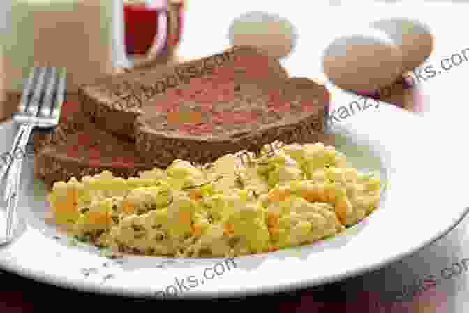 A Plate Of Scrambled Eggs With Toast Eggs Sardines Custard Baked Beans