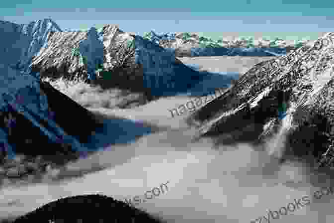 A Stunning Photograph Of A Vast, Icy Arctic Landscape, With Snow Capped Mountains In The Distance And A Lone Figure Standing On The Edge Of A Frozen Lake. Islands Apart: A Year On The Edge Of Civilization