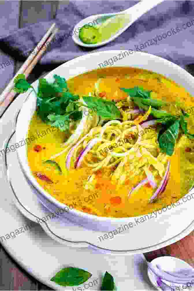 A Vibrant And Aromatic Bowl Of Khao Soi, With Its Characteristic Crispy Noodles, Tender Chicken, And Flavorful Broth. Floyd S Thai Food Keith Floyd