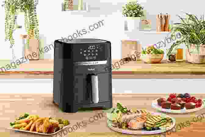 An Air Fryer Sitting On A Kitchen Counter Surrounded By Various Fresh Ingredients, Highlighting The Convenience And Versatility Of Air Frying. The Essential Air Fryer Cookbook For Beginners: Quick Easy Affordable Air Fryer Recipes For Beginners And Advanced Users On A Budget