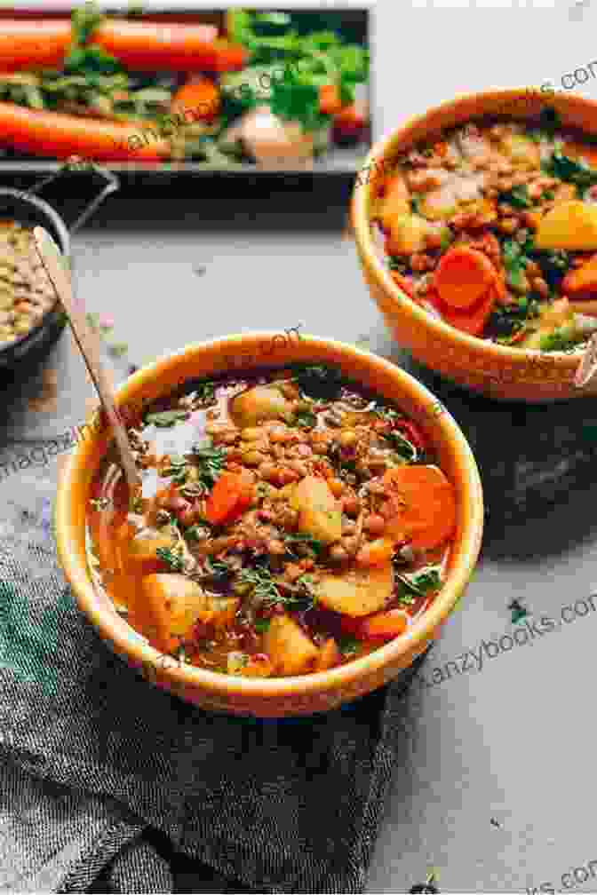 An Image Of A Colorful Plate Of Plant Based Dishes, Including A Lentil Soup, Roasted Vegetables, And A Quinoa Salad The Simple Comfort Plant Based Diet Cookbook For Beginners: Quick Easy Recipes For A Healthy Plant Based Lifestyle