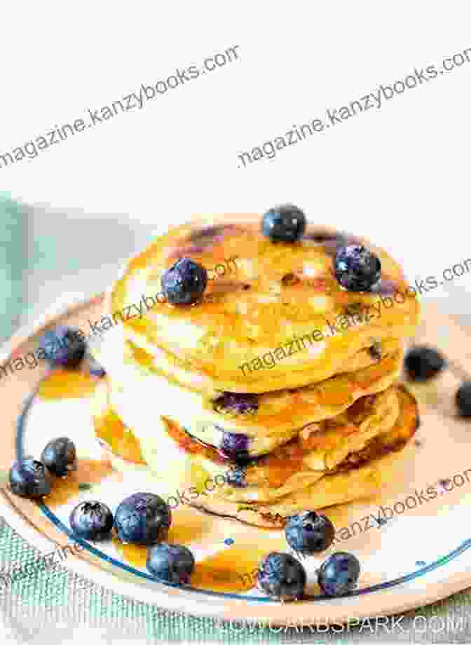 Fluffy Keto Pancakes Topped With Fresh Blueberries KETO DIET COOKBOOK FOR BEGINNERS: 300+ EASY KETOGENIC RECIPES FOR WEIGHT LOSS